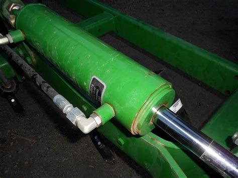 Remove the external steel wire ring. . How to disassemble a john deere hydraulic cylinder